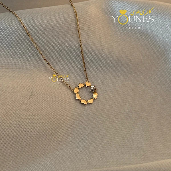 تصویر دوم گردنبند طلا قلب دایره نگین